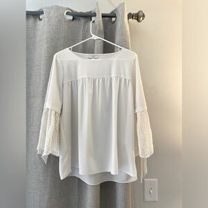 Small cream Loft top.  Lace bell sleeves.